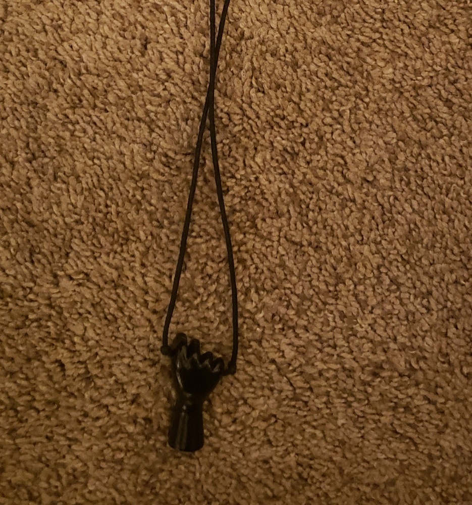 Black fist necklace